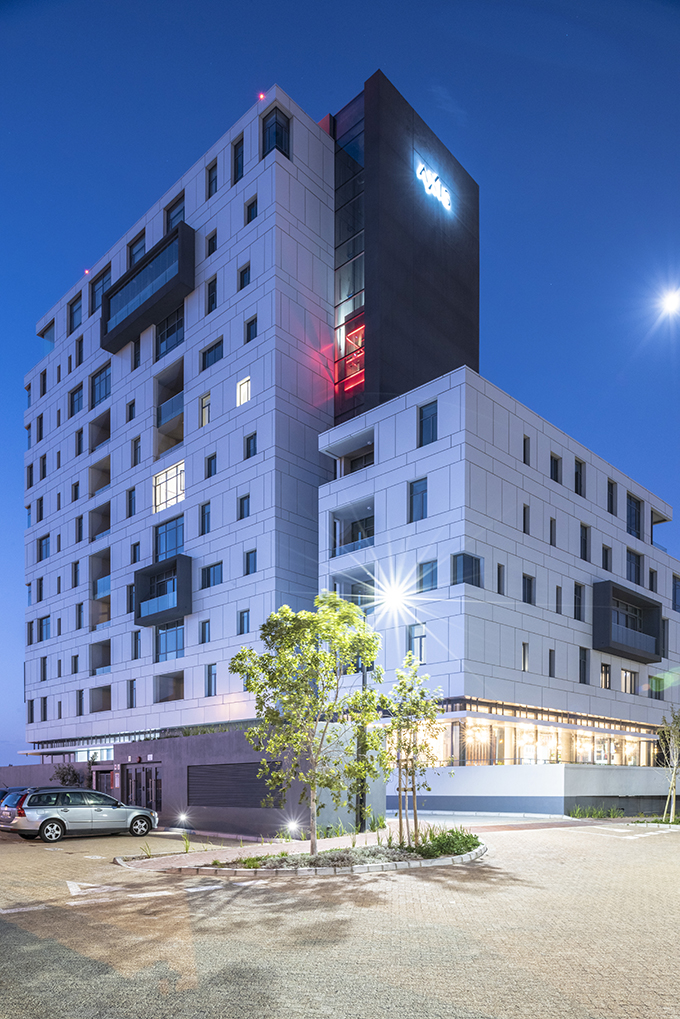 Axis - Sculpted Monolithic Apartment Block by dhk