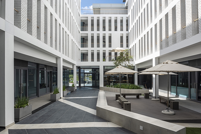 Axis - Sculpted Monolithic Apartment Block by dhk