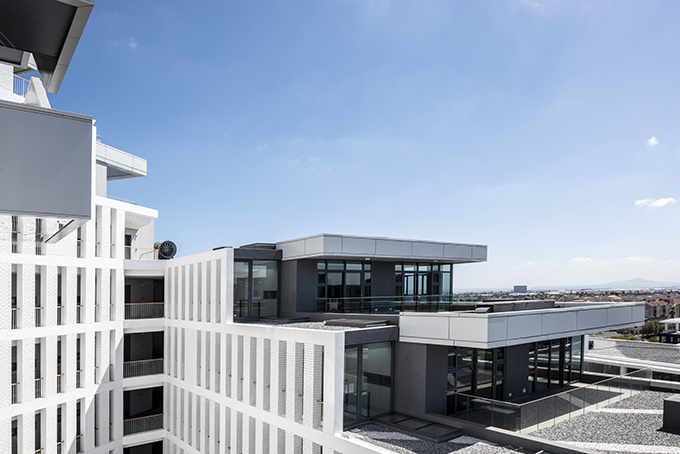 Axis - Sculpted Monolithic Apartment Block by dhk