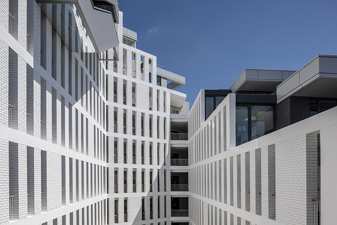 Axis - Sculpted Monolithic Apartment Block by dhk