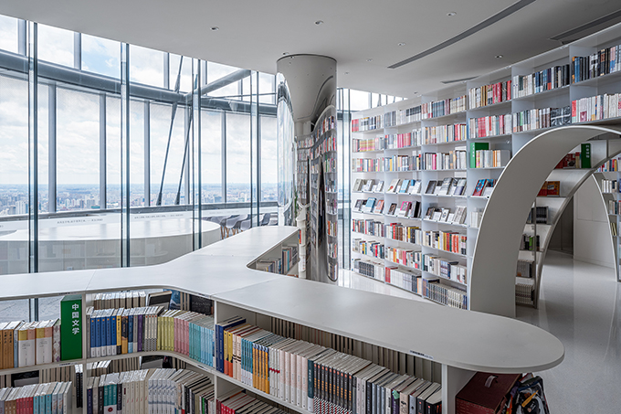 Books over the clouds by Wutopia Lab