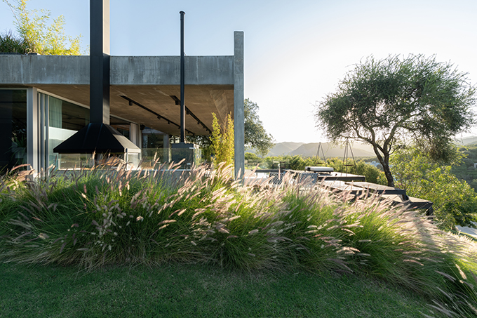 Estudio Herbera designed this stunning single-family residence in Mendiolaza, Córdoba, Argentina. Take a look at the complete story after the jump.