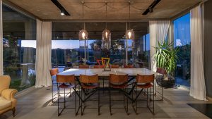 Estudio Herbera designed this stunning single-family residence in Mendiolaza, Córdoba, Argentina. Take a look at the complete story after the jump.