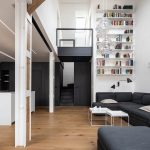 Attic Apartment with a Black Box by Komon architekti