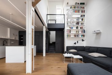 Attic Apartment with a Black Box by Komon architekti
