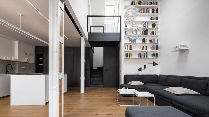 Attic Apartment with a Black Box by Komon architekti