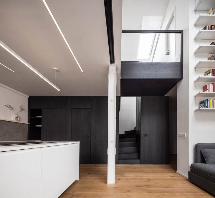 Attic Apartment with a Black Box by Komon architekti