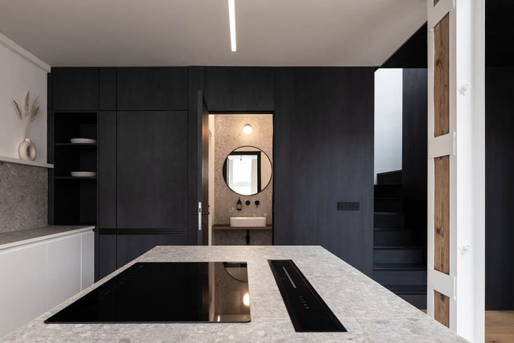 Attic Apartment with a Black Box by Komon architekti