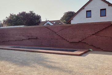 Revitalisation of Hus?v park in Prague – SUPERPOWER WALL by S K U L L studio